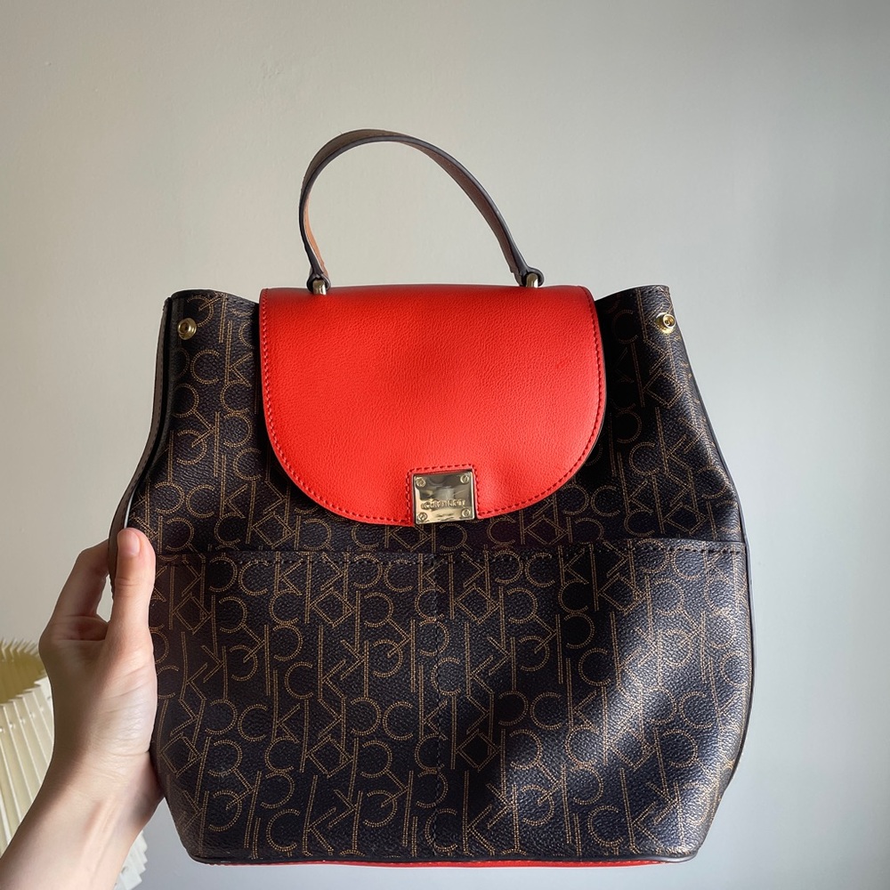 Calvin Klein Red and Brown Backpack with Monogram Design